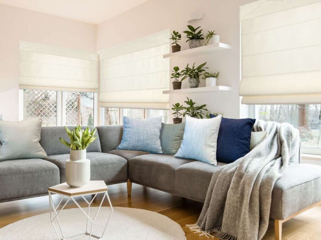 Shades differ from blinds because they cover the entire window with one continuous piece, rather than adjustable slats.