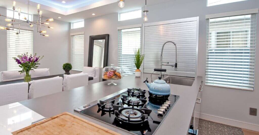 Norman Smart Privacy Faux Wood Blinds in Kitchen Windows