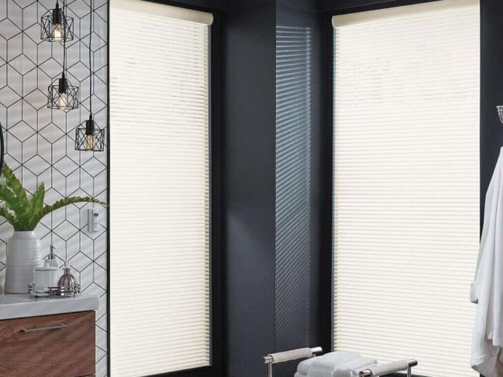 Motorized sheer shades in a modern bathroom