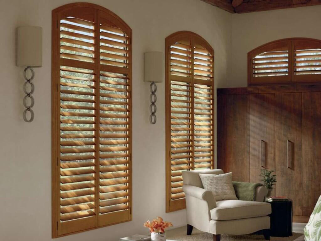This is a picture of wood shutters in a living room