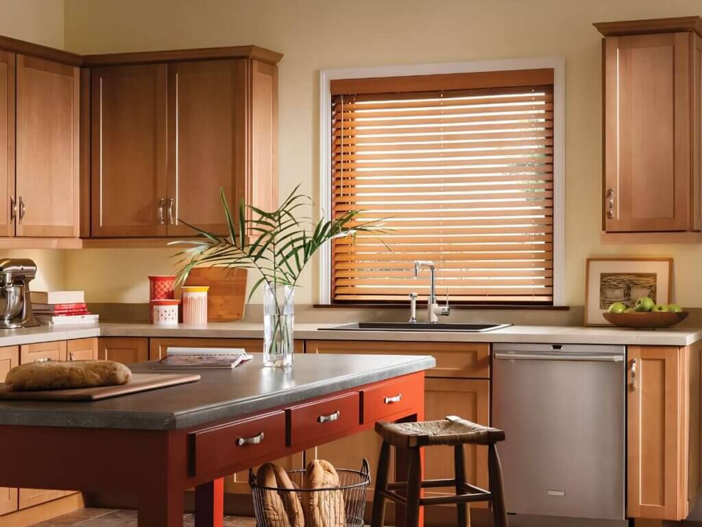 This is a photo of a faux wood blinds in a kitchen