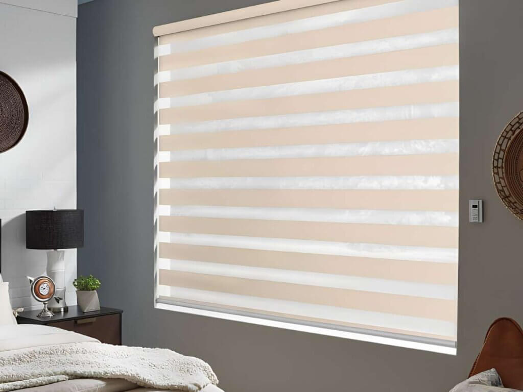 Motorized layered shades in a bedroom